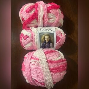 3 Skeins of Red Heart Boutique Sashay yarn. Color: Tutu